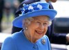 Queen Elizabeth wearing a light blue coat and hat