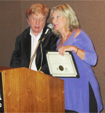 Chris Gray presenting award