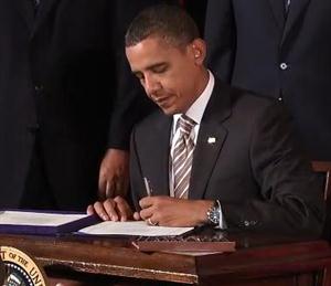 President Obama Signing Bill